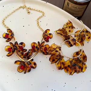 Vintage leopard acrylic flower petal jewelry set with necklace and hoop earrings