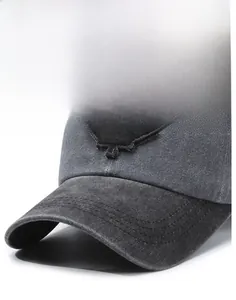 Close-up of a stiff brim with vintage frayed maple leaf patch on a washed cotton baseball cap