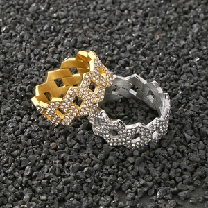 Detail of hip-hop style chain rings in gold and silver finish with micro-pave rhinestones