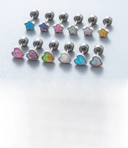 Detail view of 12-piece star and heart opal ear studs set in titanium steel and silver