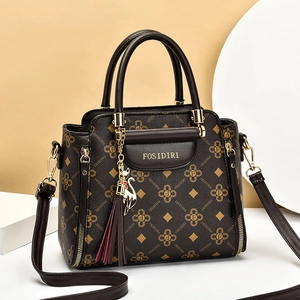Dark brown faux leather tote bag with letter patterns and cat tassel charm