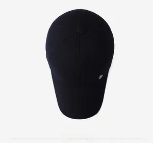 Top view of heavy wool baseball cap showing thick fabric texture and metal logo