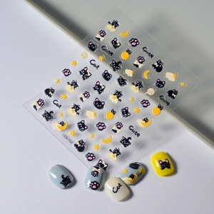 5D embossed nail stickers featuring black cats, yellow moons and stars for DIY manicure