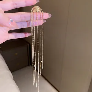 Elegant gold multi-layered long tassel ear cuff with minimalist round bead chain design