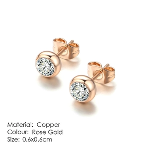 Detailed macro view of 6mm round cubic zirconia stud earrings in rose gold plated copper