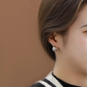 Minimalist S925 sterling silver multilayer C-shaped hoop earrings worn by a model