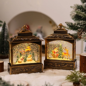 Detail of vintage Christmas lanterns with Santa Claus and reindeer in golden frame