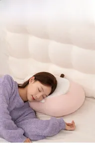 Soft pink and white plush apple seal pillow made of cozy sherpa fleece for home decor