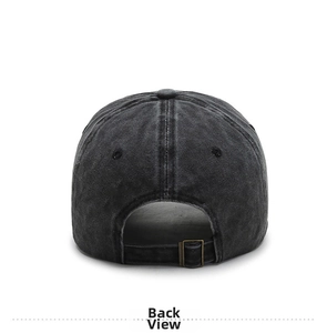 Detail view of washed denim baseball cap back with adjustable bronze metal buckle