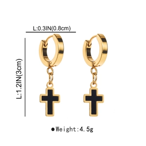 Detail view of gold hoop earrings with black cross charms and precise dimensions
