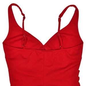 Detail of adjustable thin spaghetti straps with metal buckles on a red dress back