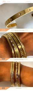 Close-up of a three-piece gold-plated bracelet set with zircon stars and ribbed textures
