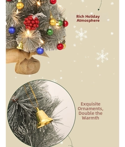 Detailed view of mini Christmas tree featuring golden bells, LED lights and burlap base