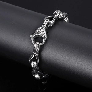 Close-up of vintage titanium steel men's bracelet with bold interlocking chain link