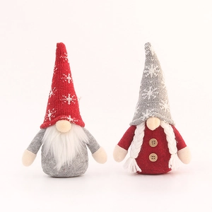 Pair of Christmas gnome plush ornaments with snowflake knit hats and long white beards
