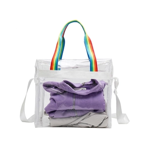 Transparent PVC beach tote with rainbow handles and adjustable white shoulder strap