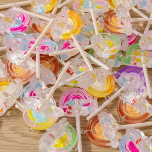 Colorful resin rainbow swirl lollipop charms with transparent bear details for DIY jewelry