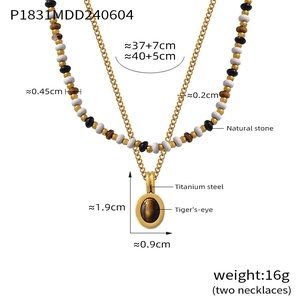 Detail of titanium steel layered necklace with tiger eye stone pendant and size specs