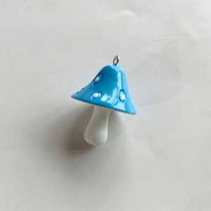 Blue resin mushroom pendant with white dots and metal loop for DIY jewelry making