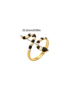 Macro shot showing dimensions of 25.2mm on a gold snake-shaped ring with enamel stripes