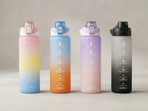 Detail of gradient sports water bottles with motivational time markers and carry handle