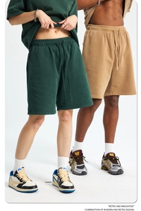 Detail view of heavy cotton terry shorts featuring drawstring waist and side pockets