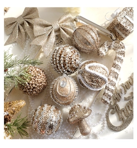 Champagne gold Christmas ornament set with glitter balls, bows, and festive pendants