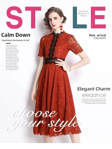Detail of burgundy lace dress with black crochet trim on waist and sleeves