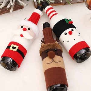 Christmas knitted wine bottle covers featuring Santa, Reindeer and Snowman characters