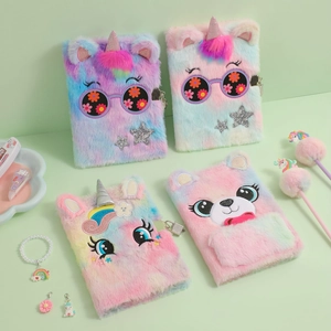 Close-up of plush A5 notebooks with rainbow tie-dye fur, unicorn designs, and metal locks