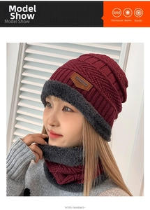 Detail of burgundy cable knit winter hat and neck warmer with thick faux fur lining