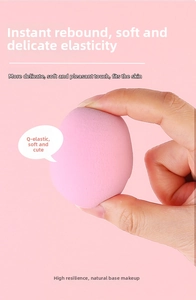 Macro shot showing the soft texture and high resilience of the pink makeup sponge