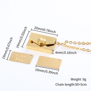 Detailed view of 18k gold envelope pendant necklace with Love You engraving and dimensions