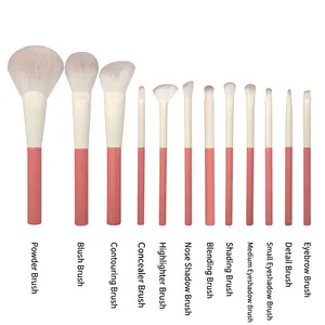 13-piece coral pink makeup brush set with soft gradient bristles and cream ferrules