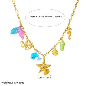 Gold ocean necklace with colorful mermaid tail, starfish, and seahorse charms and sizes