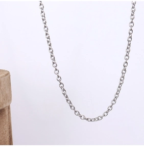 Detailed view of silver titanium steel cable chain link with reflective metallic finish