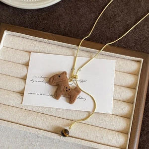 Retro golden snake chain necklace with brown flocked horse pendant and tiger eye bead