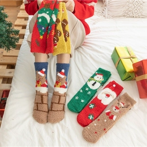 Thick coral fleece Christmas socks featuring festive patterns for winter warmth