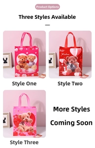 Three designs of pink teddy bear and heart printed non-woven gift bags with handles