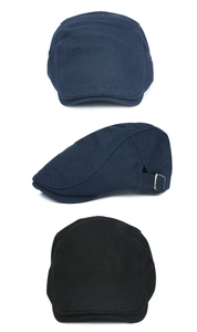 Detail view of breathable mesh fabric and adjustable metal buckle on blue and black caps