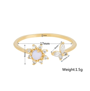 Detail view of 18K gold ring with butterfly and flower motifs including size measurements