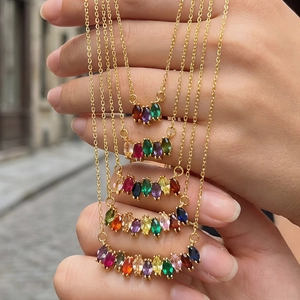 Vintage gold layered necklace with marquise cut colorful zircons in a rainbow display