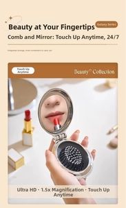 Close-up of portable folding hairbrush with 1.5x magnifying mirror and massage bristles