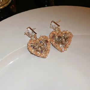 Elegant champagne gold heart-shaped zircon drop earrings for women with crystal floral design