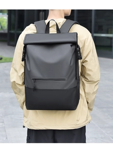 Close-up of waterproof roll-top backpack with dual-tone fabric and buckle details