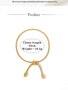 Detail of adjustable gold chain bracelet with sliding bead clasp and teardrop pendants