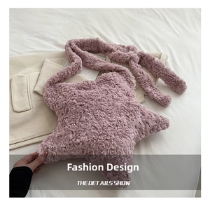 Detail showing the plush star-shaped shoulder bag with soft morandi pink faux fur texture