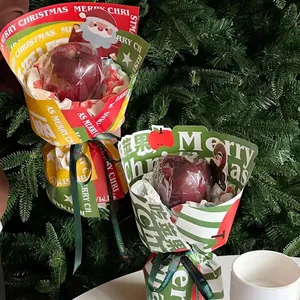 Christmas kraft paper bouquet wrapping with Merry Christmas patterns and ribbons