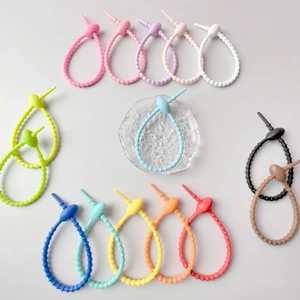 Colorful silicone cable ties and organizer straps in multiple vibrant colors for DIY use