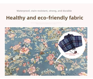 Waterproof floral and plaid fabric detail showing water droplets on the surface